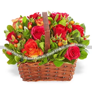 Autumn caprice - a basket of red and orange roses